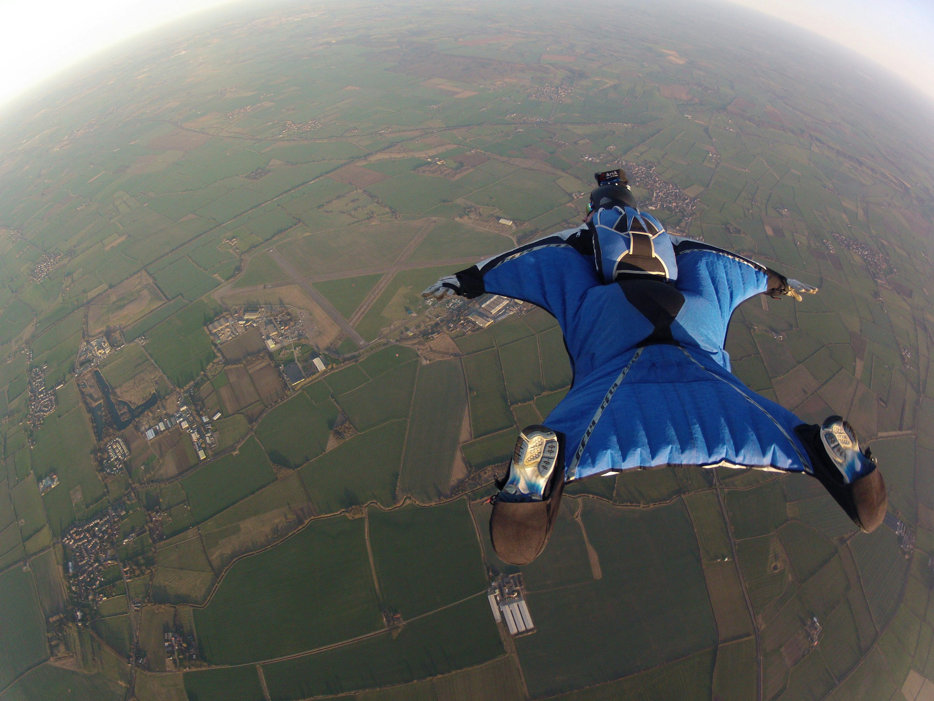 Wingsuit flying insurance: the escort of extreme sports